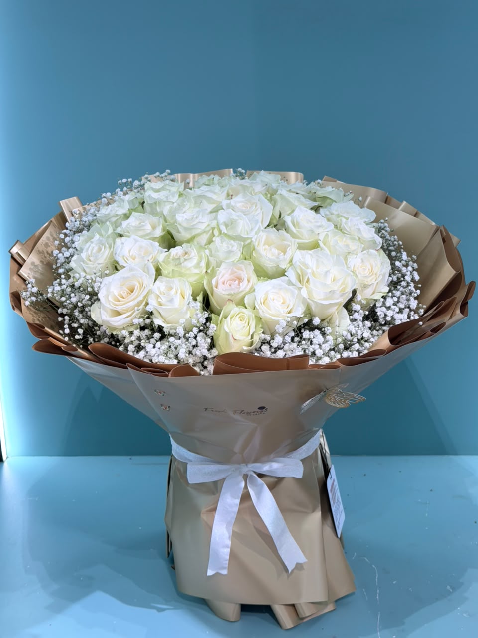 The Golden Opal Luxury White Rose Bouquet